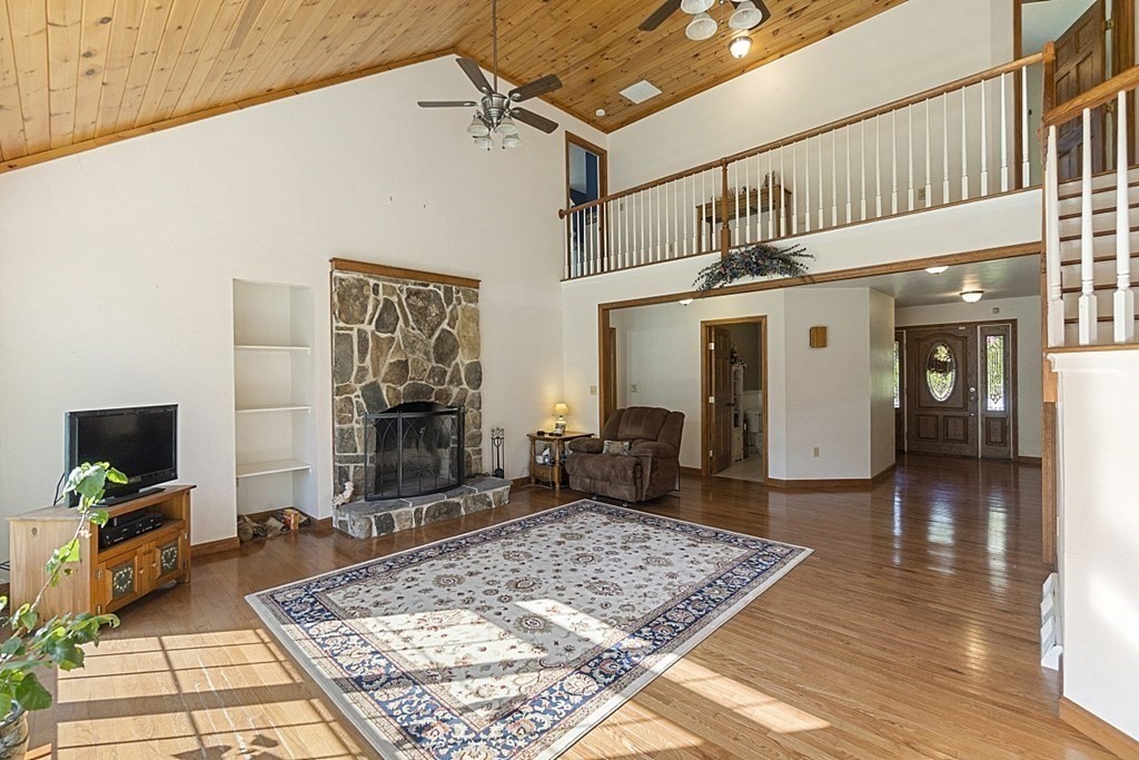 45 Walker Road Ware, MA 01082 - Photo 5 of 42 a living room with furniture and a flat screen tv