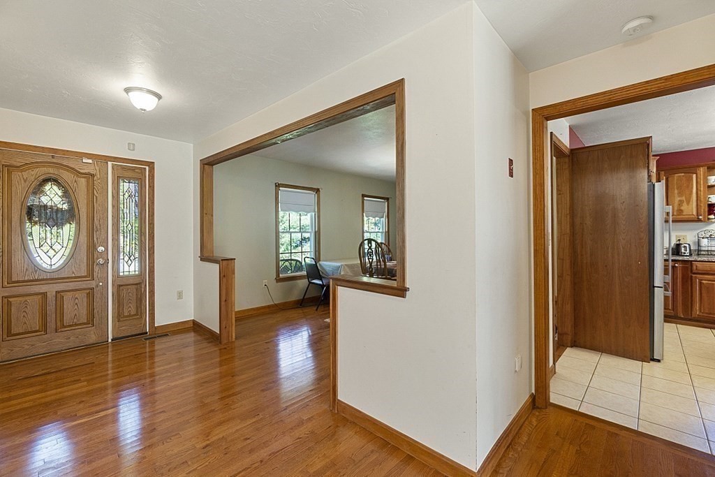45 Walker Road Ware, MA 01082 - Photo 9 of 42 a view of a hallway view with wooden floor and living room