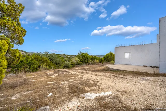 a view of a backyard of a house
