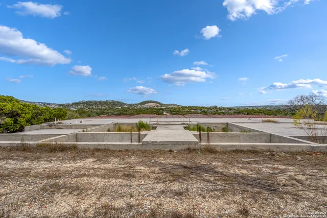 a view of a lake with a big yard