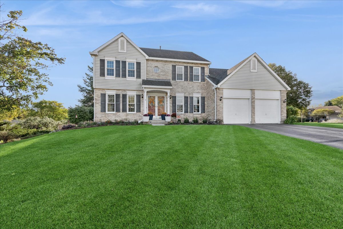 2 Daybreak Ridge Trail Cary, IL 60013 - Photo 1 of 37 a front view of house with yard and green space