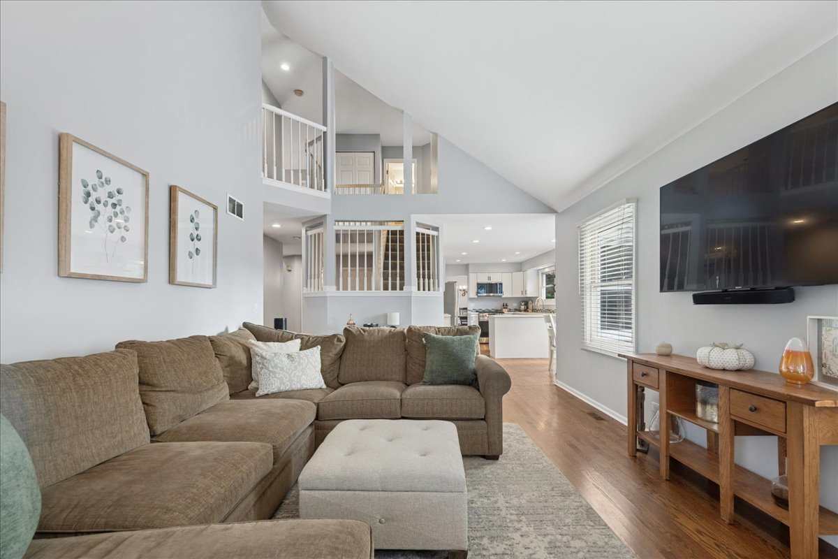2 Daybreak Ridge Trail Cary, IL 60013 - Photo 13 of 37 a living room with furniture and a flat screen tv
