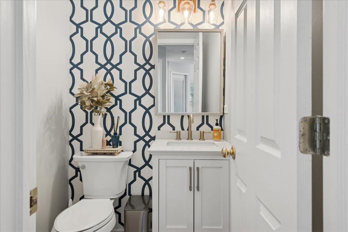 2 Daybreak Ridge Trail Cary, IL 60013 - Photo 15 of 37 a bathroom with a sink toilet and mirror