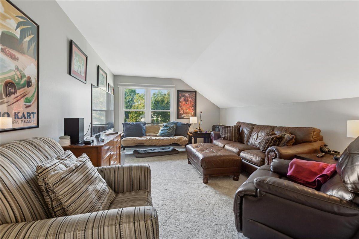 2 Daybreak Ridge Trail Cary, IL 60013 - Photo 24 of 37 a living room with furniture and a window