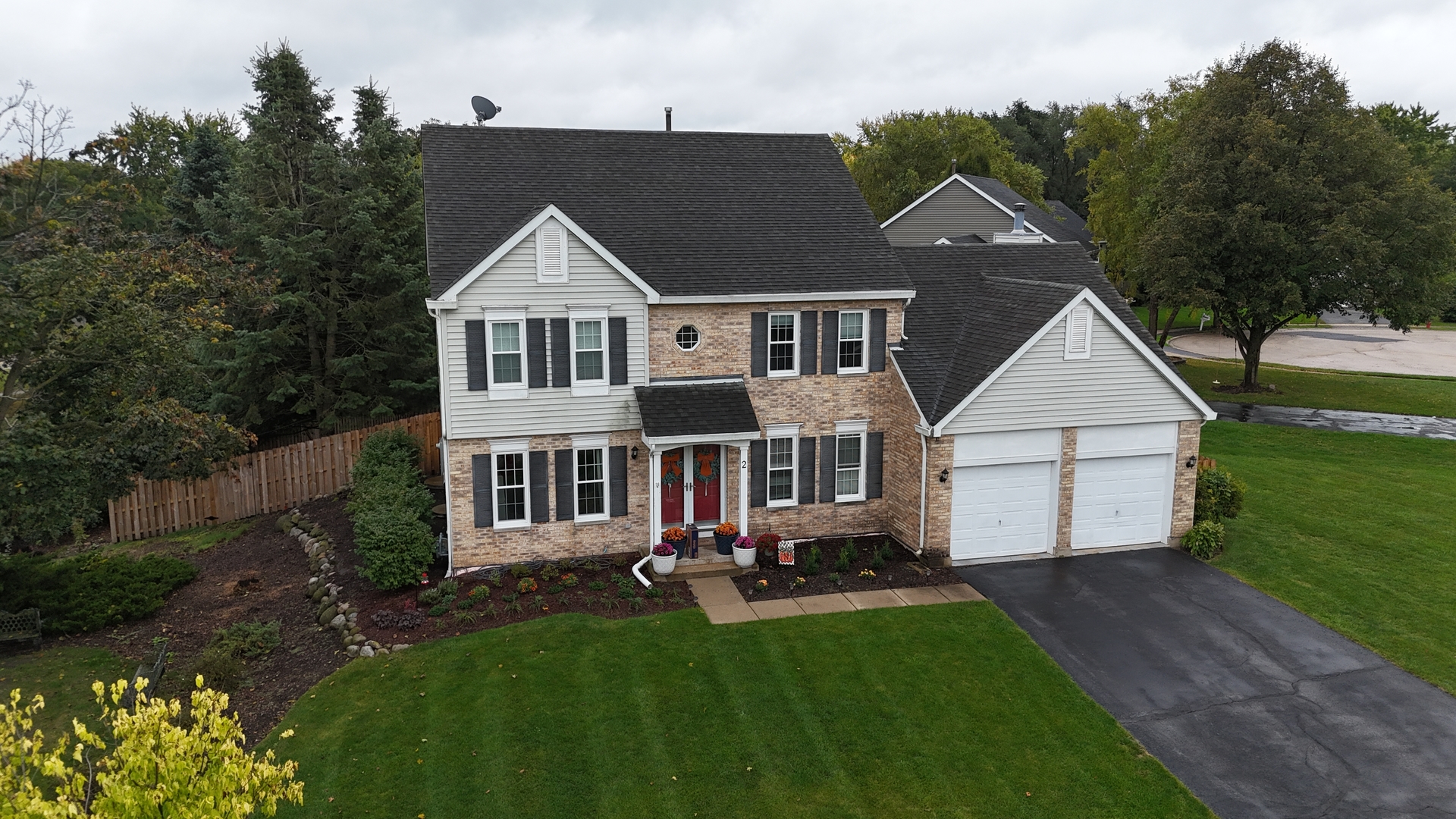 2 Daybreak Ridge Trail Cary, IL 60013 - Photo 26 of 37 a front view of house with yard and green space