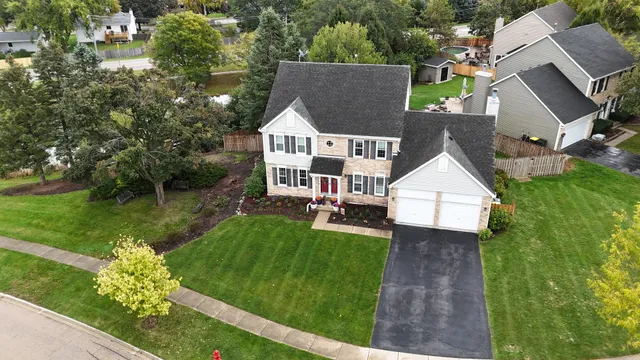 a aerial view of a house with garden