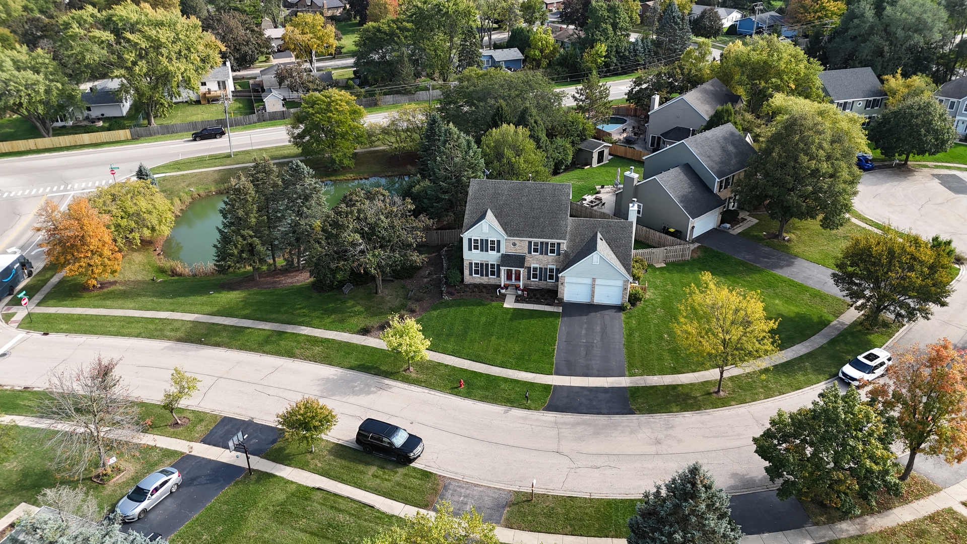 2 Daybreak Ridge Trail Cary, IL 60013 - Photo 37 of 37 an aerial view of a house with a garden and swimming pool