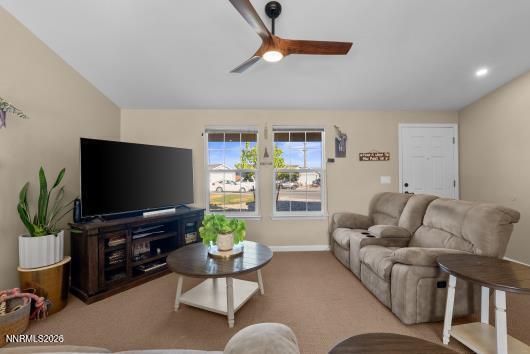 552 Spur Court Fernley, NV 89408 - Photo 10 of 46 a living room with furniture and a flat screen tv
