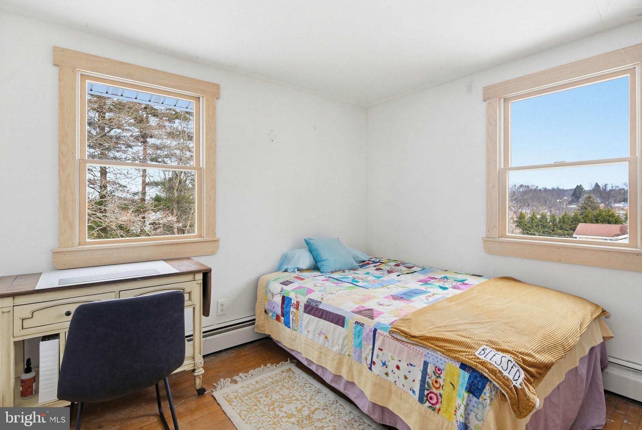 2124 Oaklyn Drive Fallston, MD 21047 - Photo 20 of 33 a bedroom with a bed a couch and a window