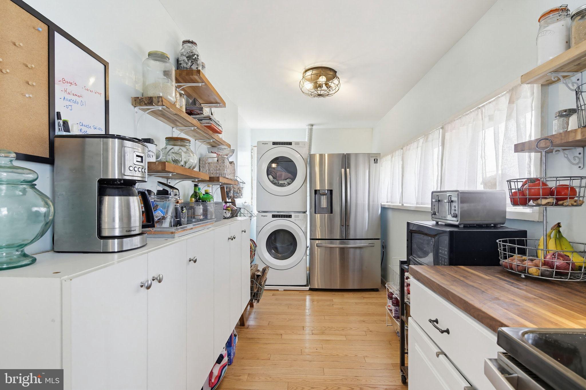 2124 Oaklyn Drive Fallston, MD 21047 - Photo 10 of 33 a kitchen with stainless steel appliances granite countertop a sink and cabinets