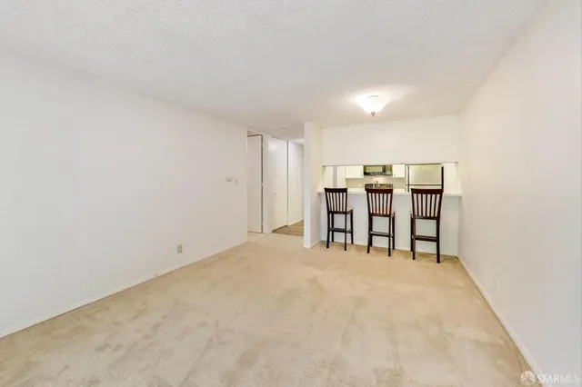 a view of an empty room with window