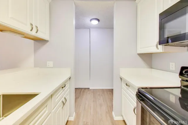a view of kitchen and utility room
