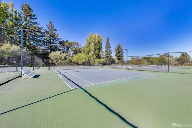 a room with gym equipment and a large window