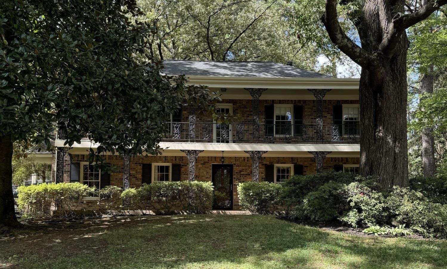 6738 River Birch Road Memphis, TN 38119 - Photo 1 of 17 View of front of house with a balcony and a front lawn
