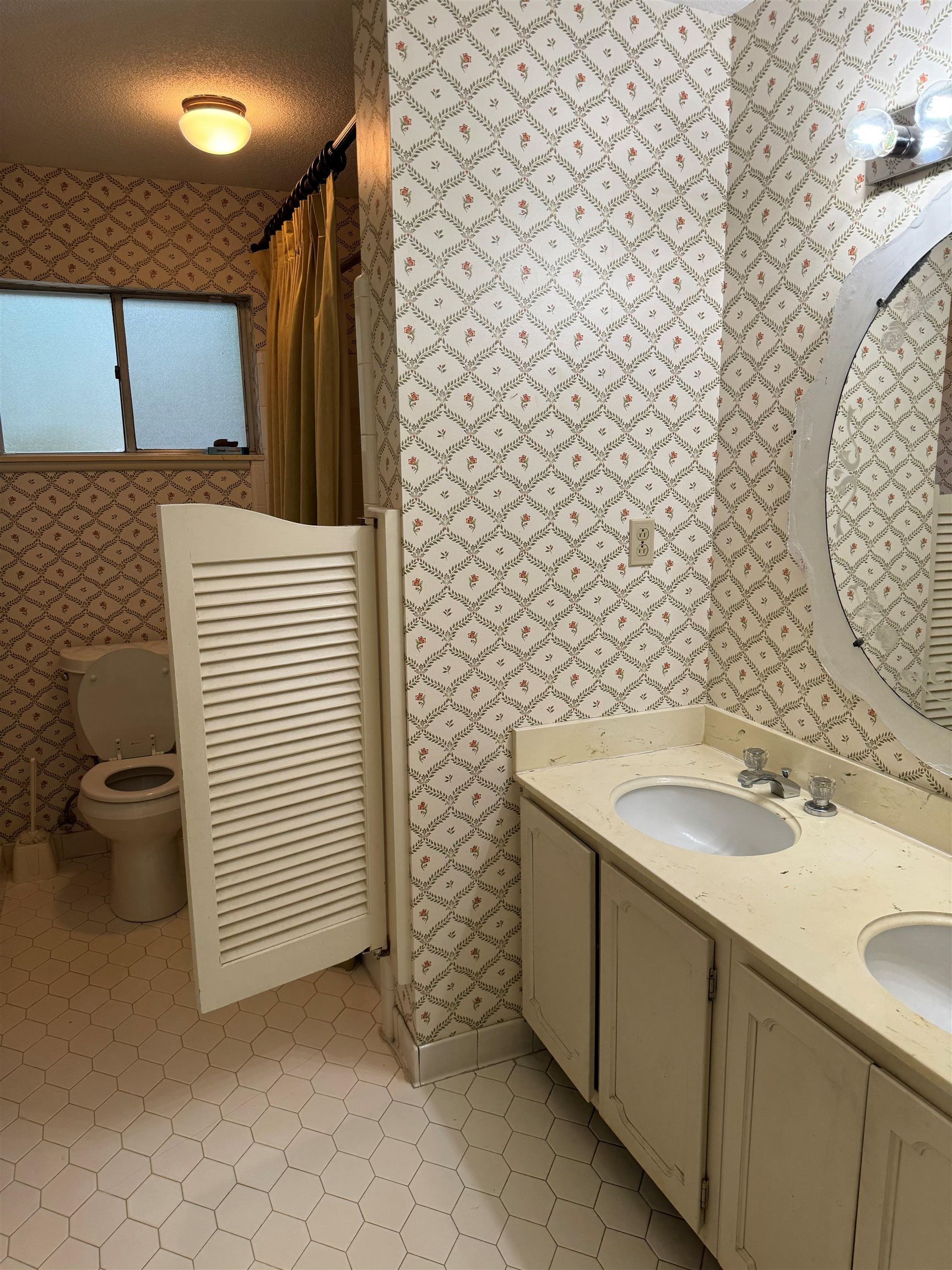 6738 River Birch Road Memphis, TN 38119 - Photo 13 of 17 Bathroom featuring tile patterned flooring, toilet, a textured ceiling, and vanity