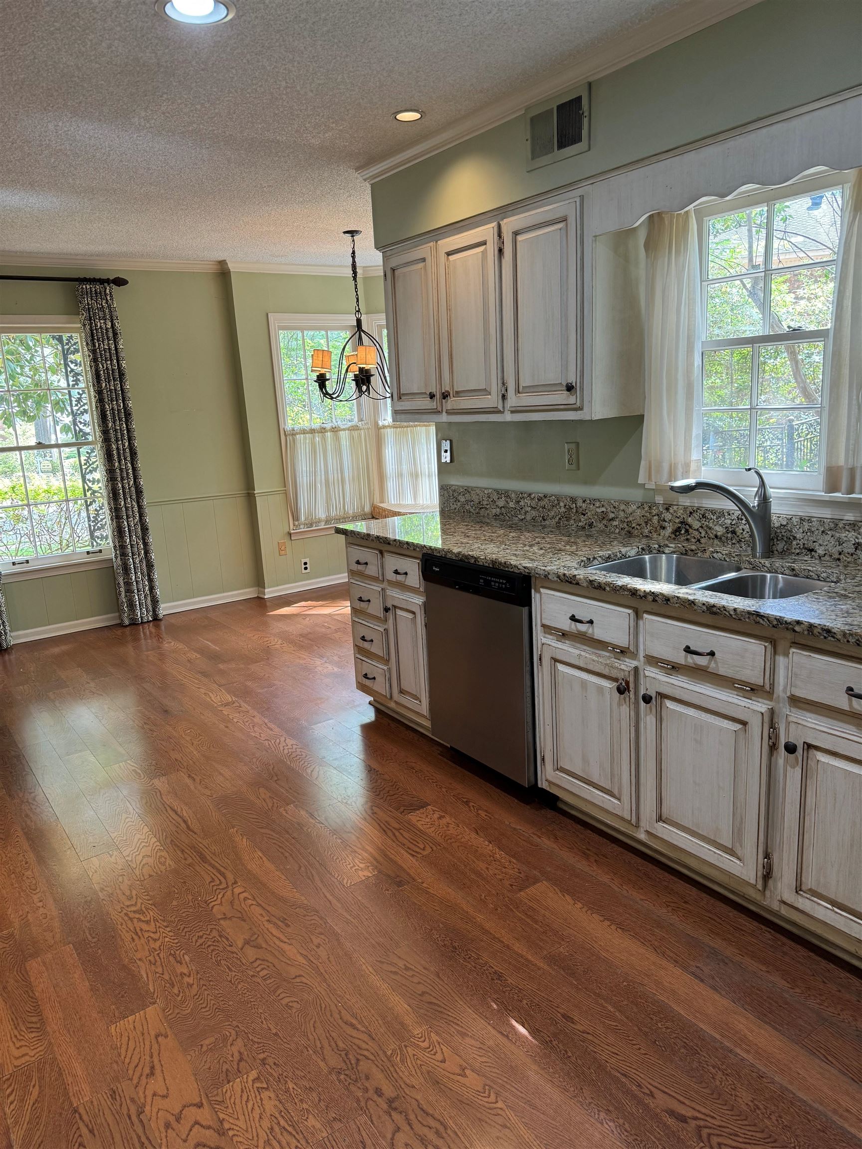 6738 River Birch Road Memphis, TN 38119 - Photo 3 of 17 Kitchen featuring plenty of natural light, dishwasher, and sink