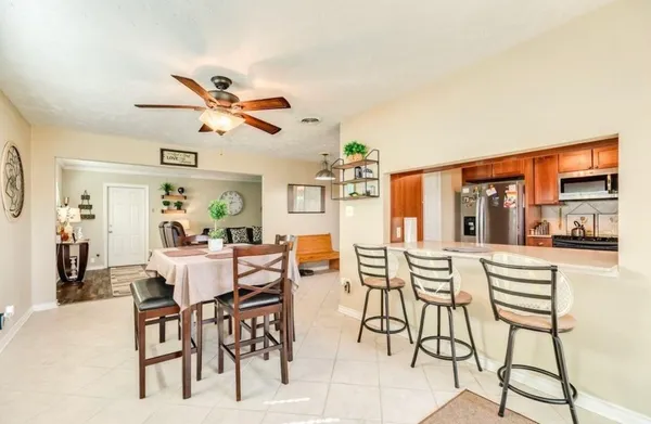 a view of a dining room with furniture