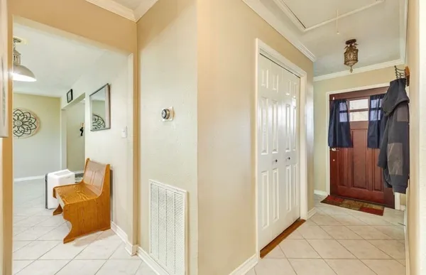 a view of a livingroom with furniture and windows