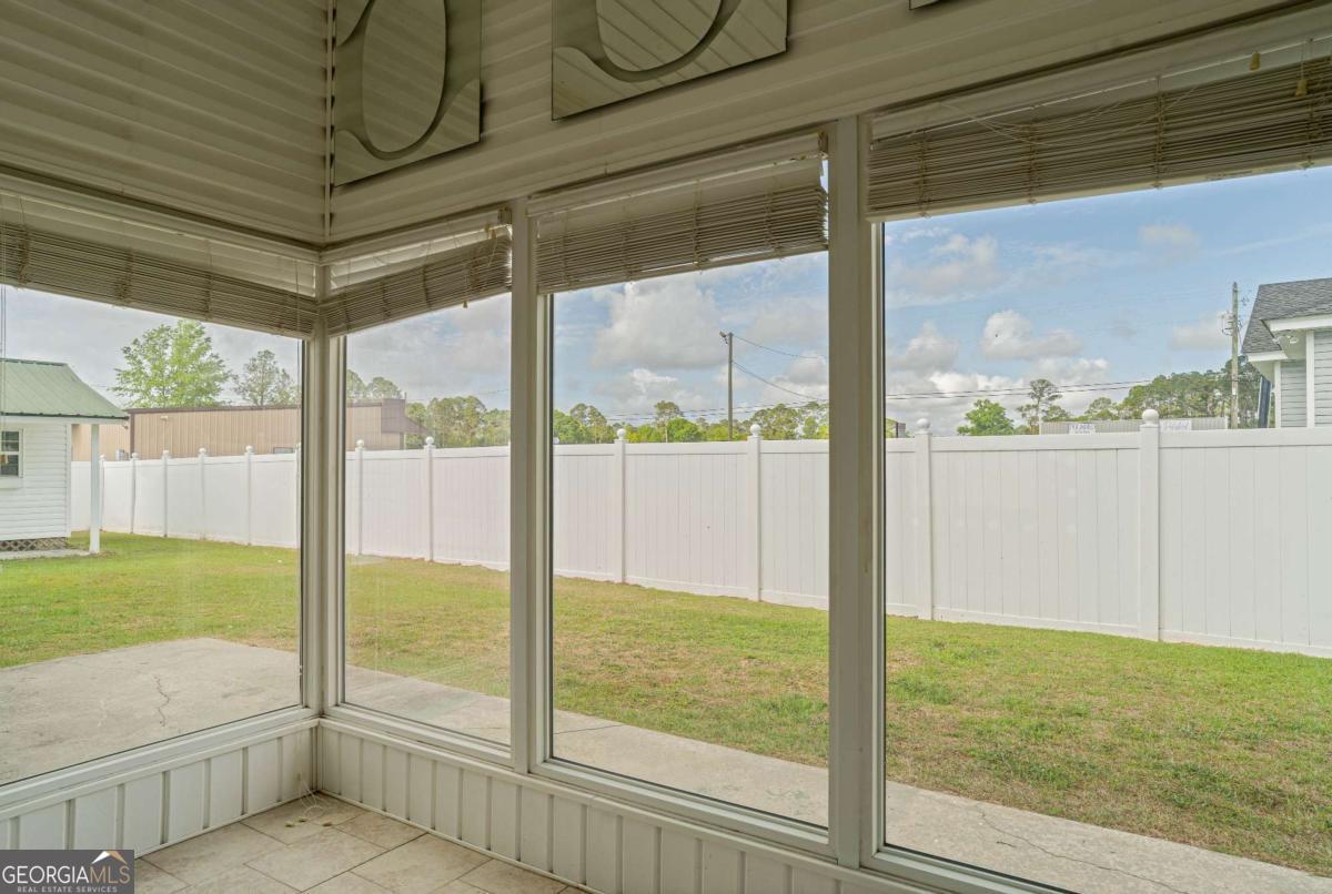 316 Fair Street Baxley, GA 31513 - Photo 19 of 64 a view of an outdoor space and tv