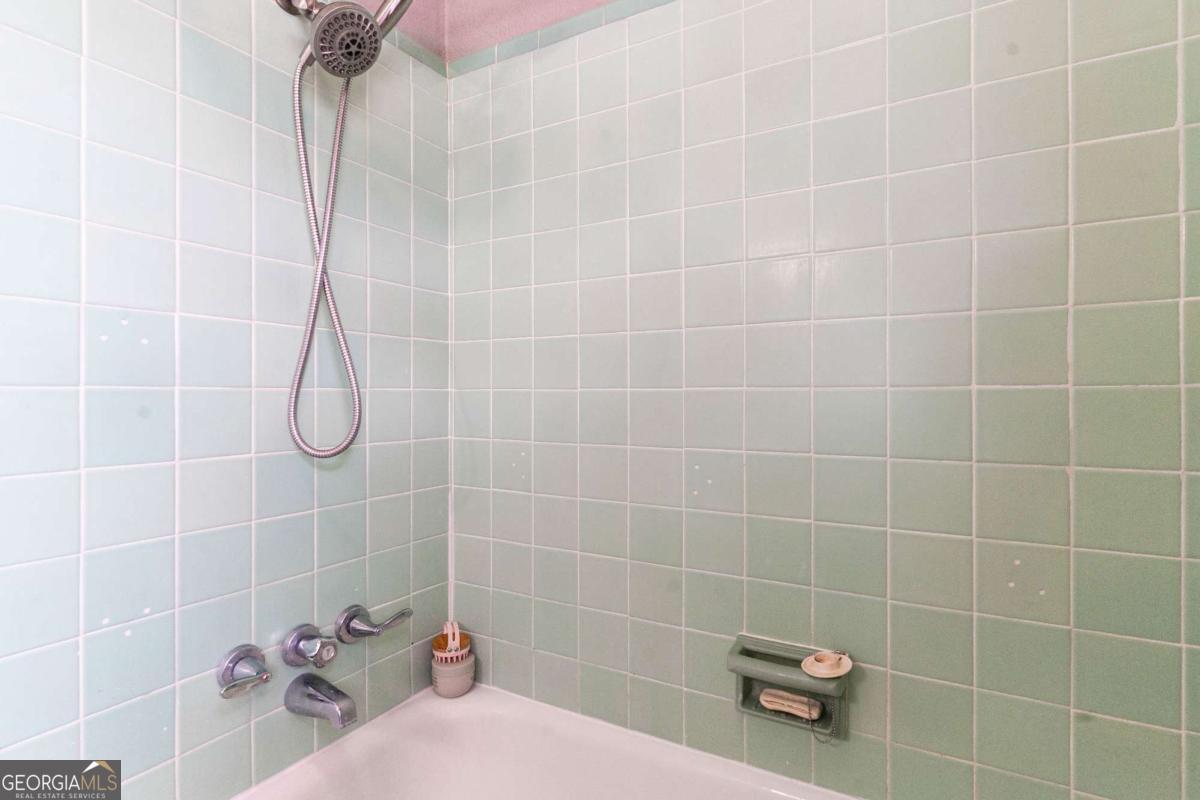 316 Fair Street Baxley, GA 31513 - Photo 32 of 64 a bathroom with a shower