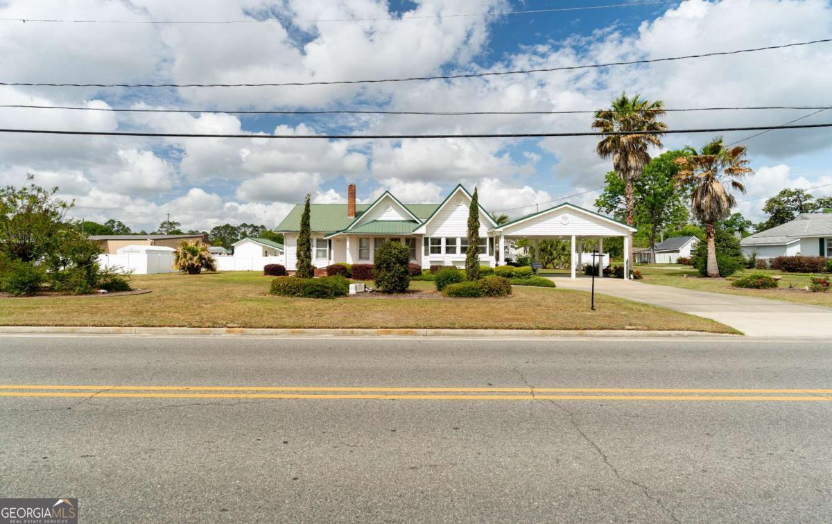 316 Fair Street Baxley, GA 31513 - Photo 39 of 64 a view of a building with a pathway