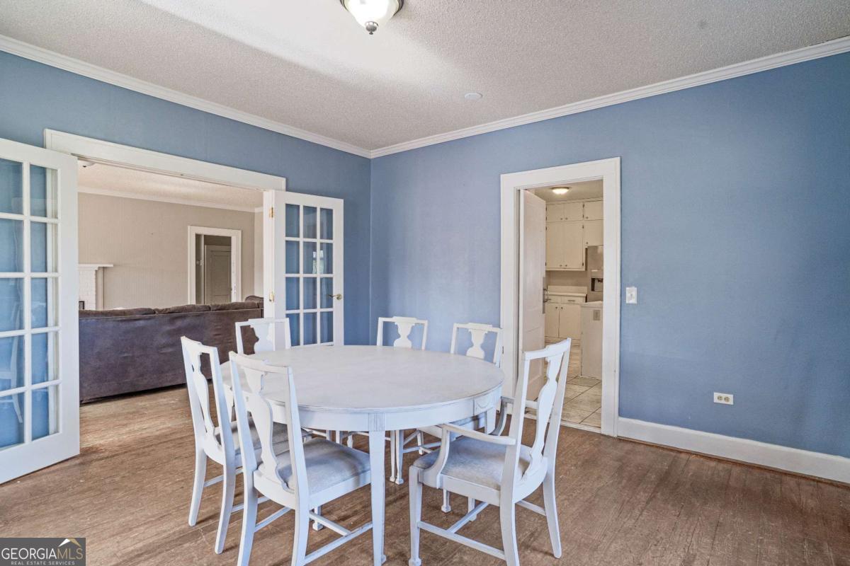 316 Fair Street Baxley, GA 31513 - Photo 5 of 64 a view of a dining room with furniture and window