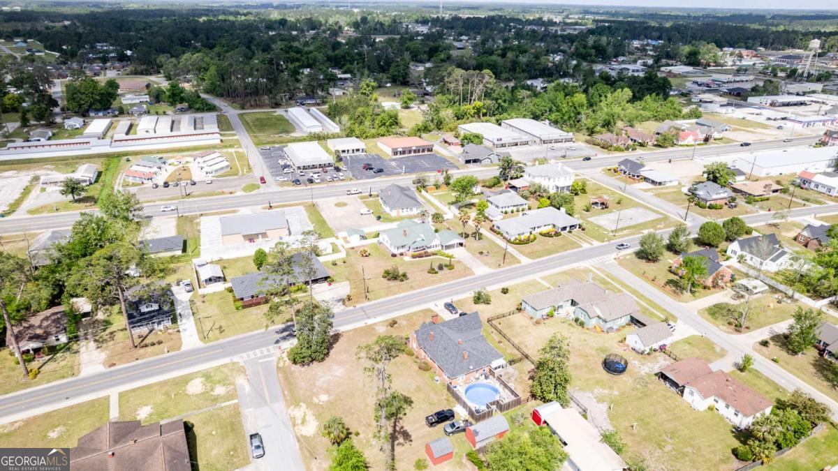 316 Fair Street Baxley, GA 31513 - Photo 54 of 64 a view of swimming pool with lawn chairs and ocean view