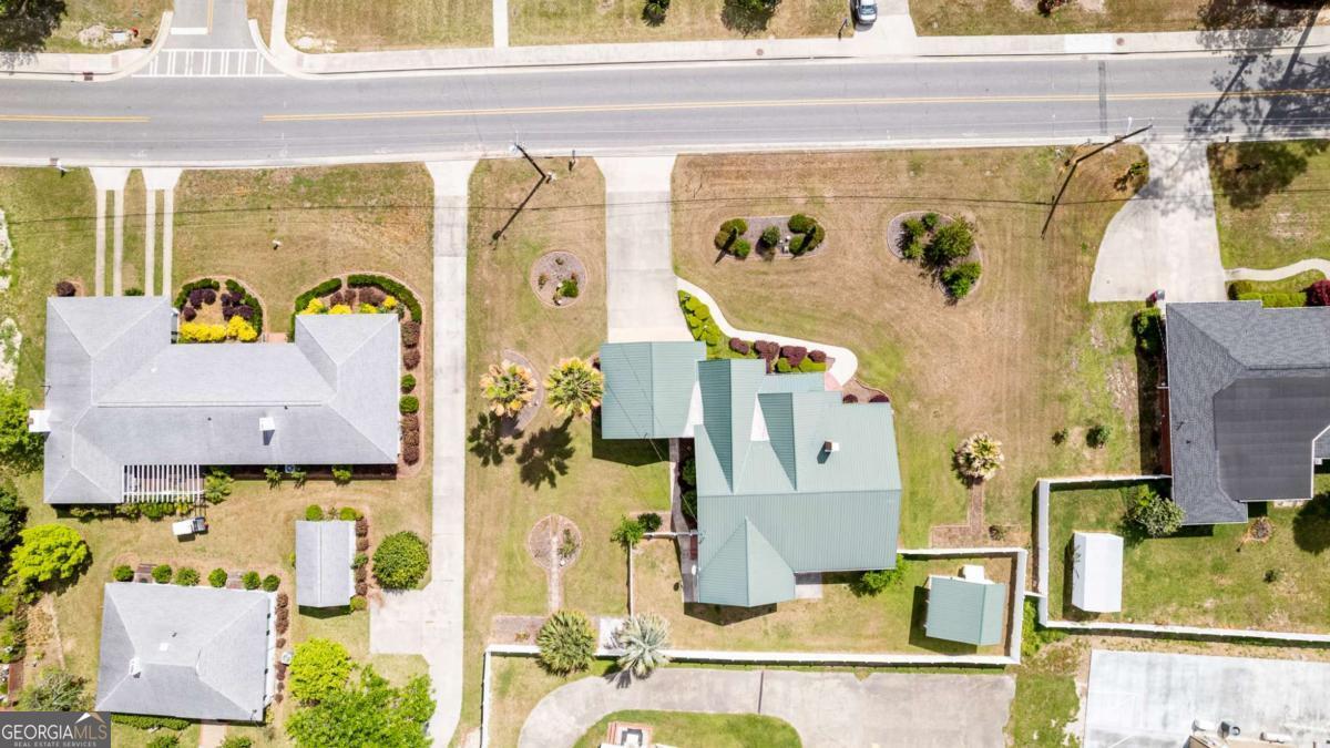 316 Fair Street Baxley, GA 31513 - Photo 59 of 64 an aerial view of residential house with outdoor seating space and swimming pool