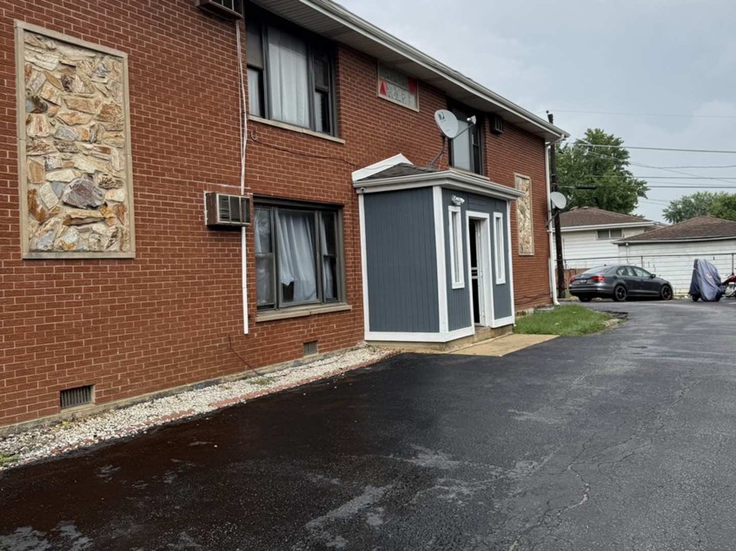 7719 South Roberts Road Bridgeview, IL 60455 - Photo 1 of 10 a front view of a house with a yard