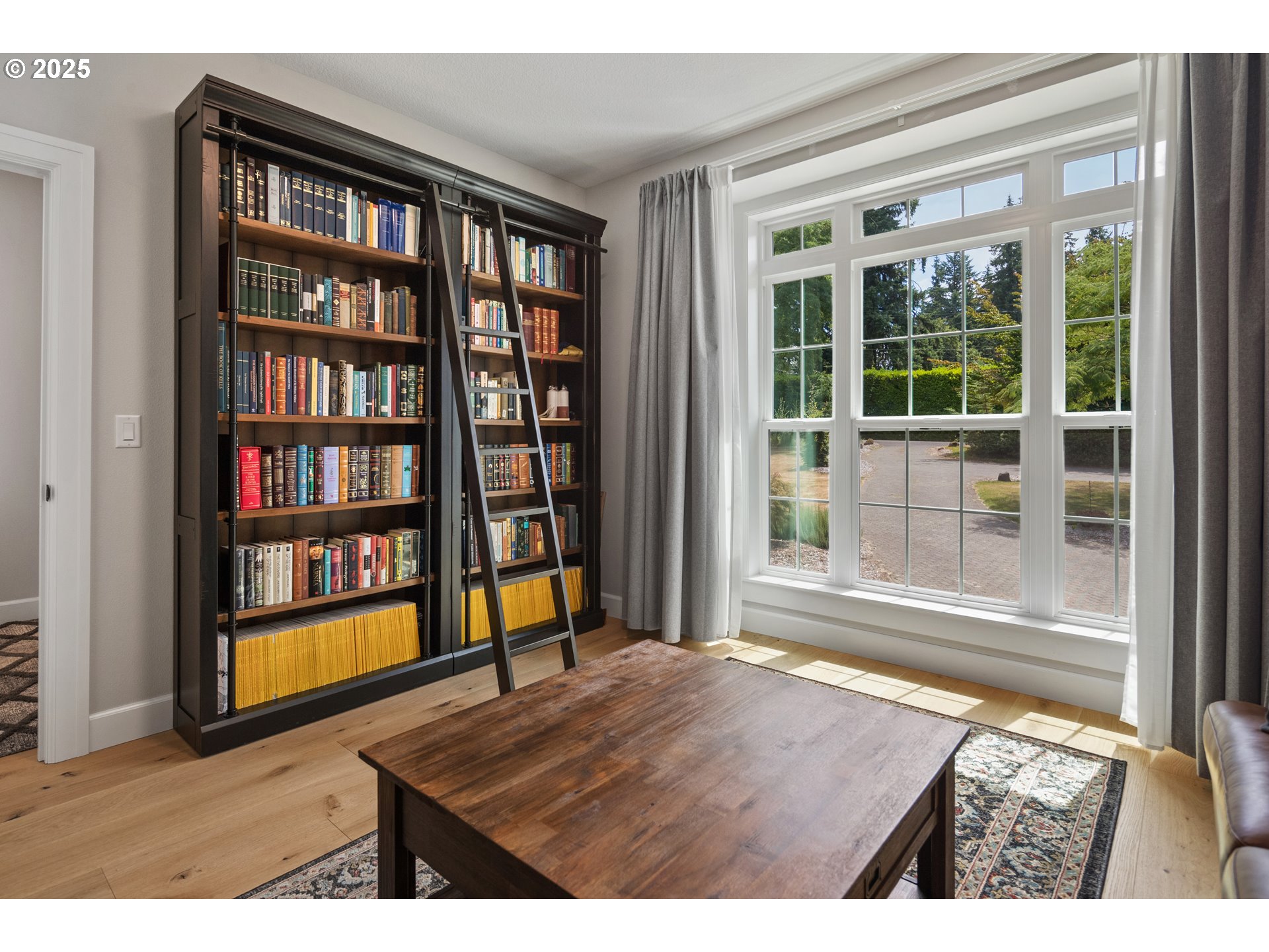 451 South Wilda Road West Linn, OR 97068 - Photo 24 of 47 a view of an empty room with wooden floor and a window
