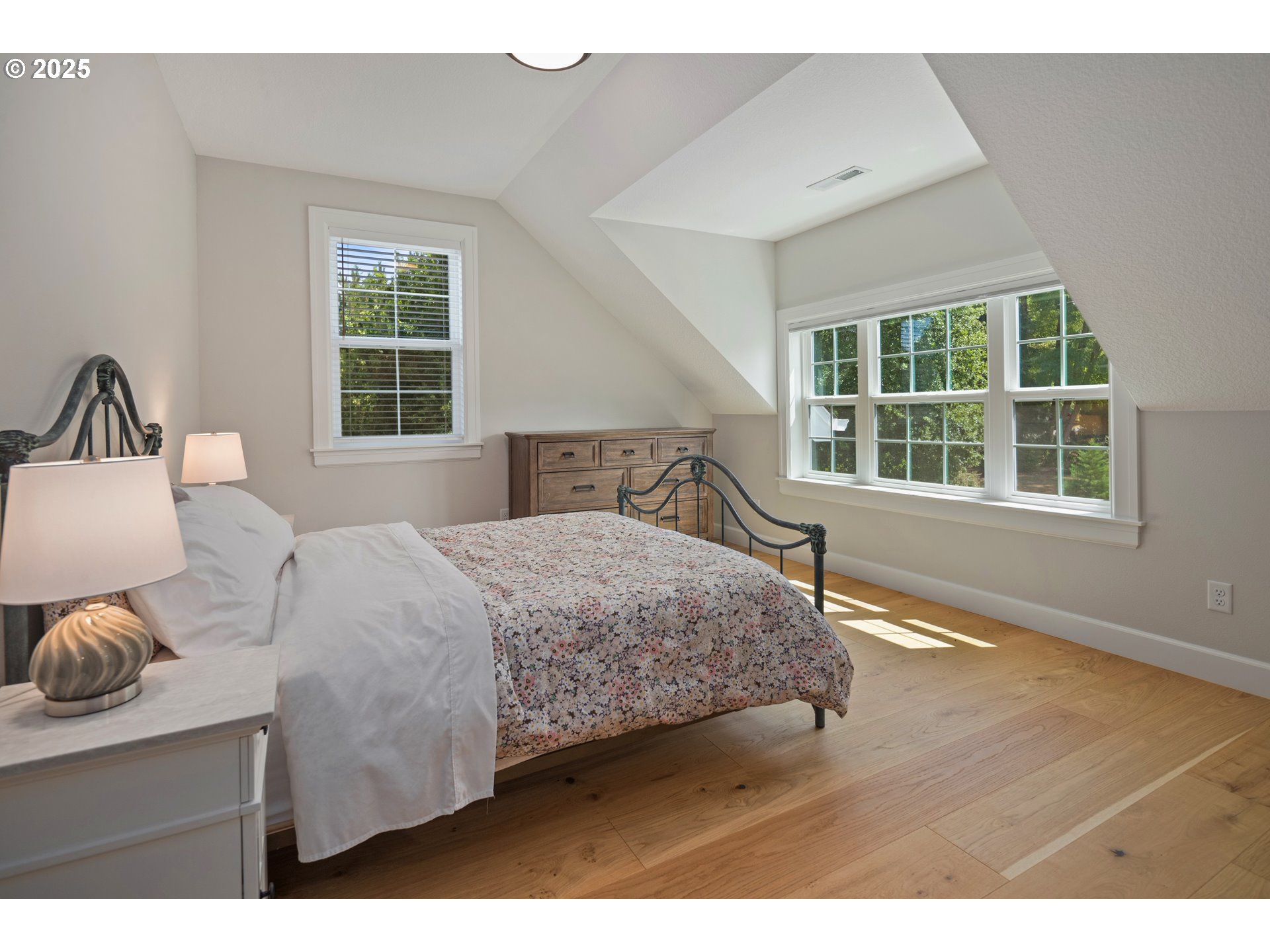 451 South Wilda Road West Linn, OR 97068 - Photo 33 of 47 a bedroom with a bed and wooden floor