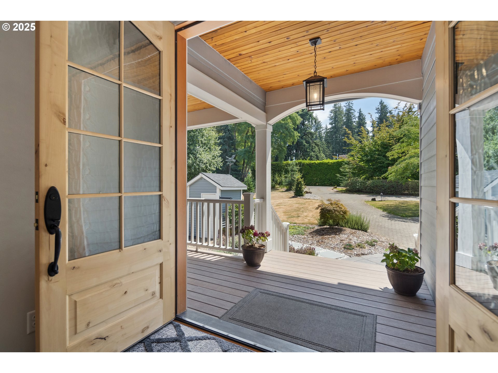 451 South Wilda Road West Linn, OR 97068 - Photo 35 of 47 a view of a living room and a floor to ceiling window or wooden floor