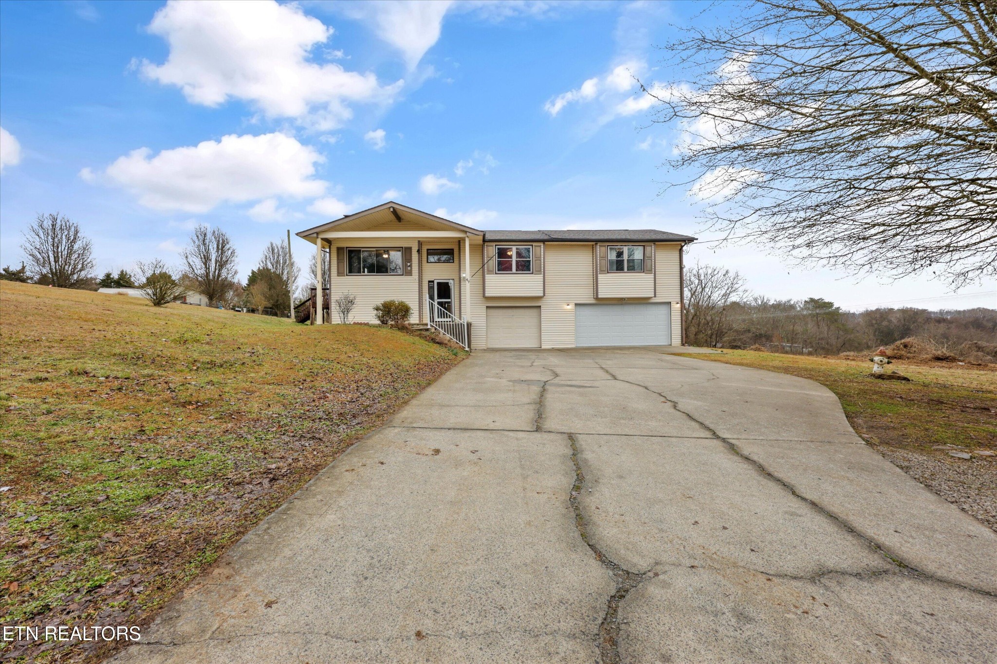 47 Paint Rock Ferry Road Kingston, TN 37763 - Photo 2 of 38 a front view of a house with a yard