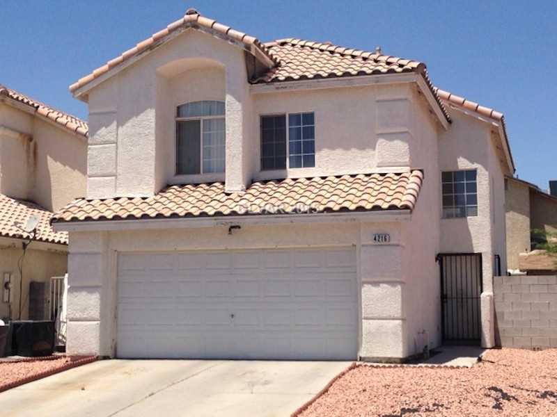 4216 Riker Avenue Las Vegas, NV 89115 - Photo 1 of 12 Facade/Exterior Front. Front of house is south facing