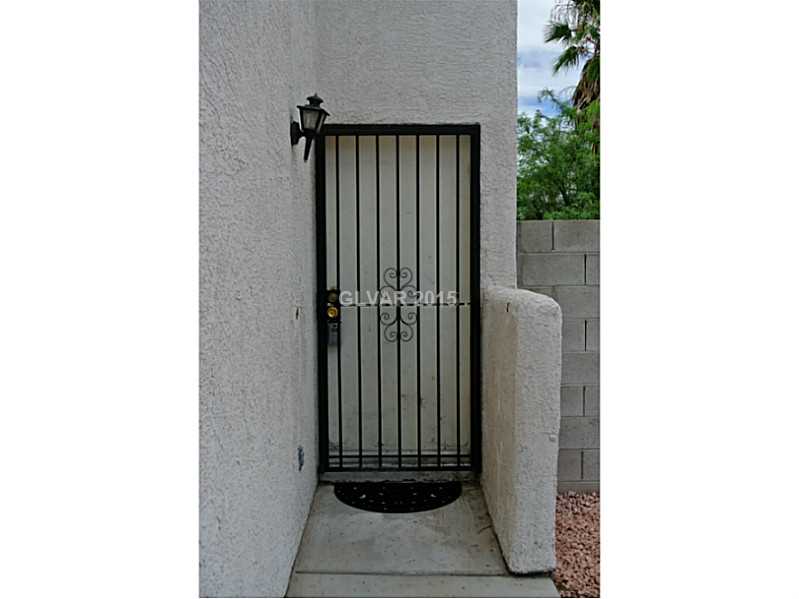 4216 Riker Avenue Las Vegas, NV 89115 - Photo 2 of 12 Facade/Exterior Front. Front Door