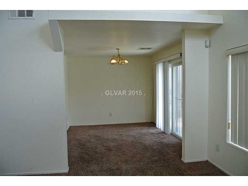 4216 Riker Avenue Las Vegas, NV 89115 - Photo 5 of 12 Dining Room. Between the Kitchen and Living Room