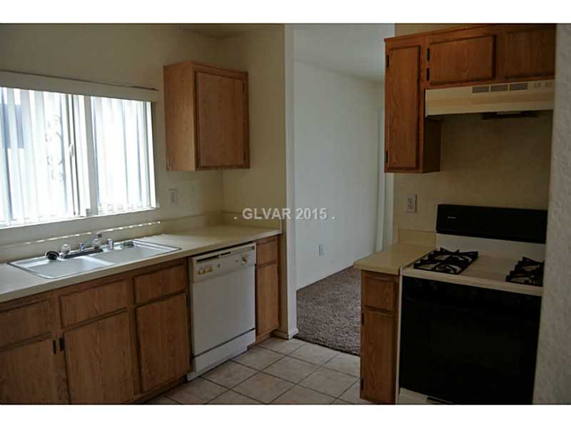 4216 Riker Avenue Las Vegas, NV 89115 - Photo 6 of 12 Kitchen. All appliances stay with property