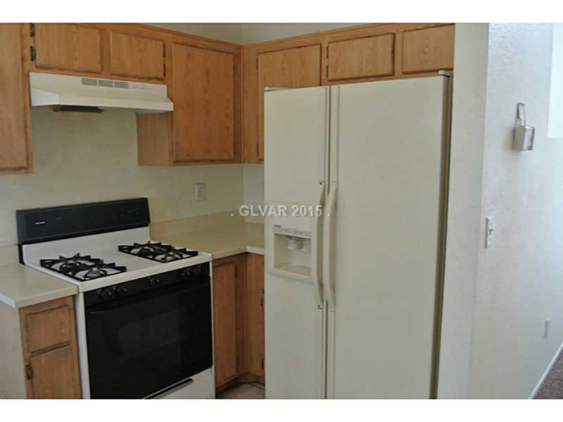 4216 Riker Avenue Las Vegas, NV 89115 - Photo 7 of 12 Kitchen. All appliances stay with property
