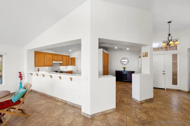 a view of a living room and dining room