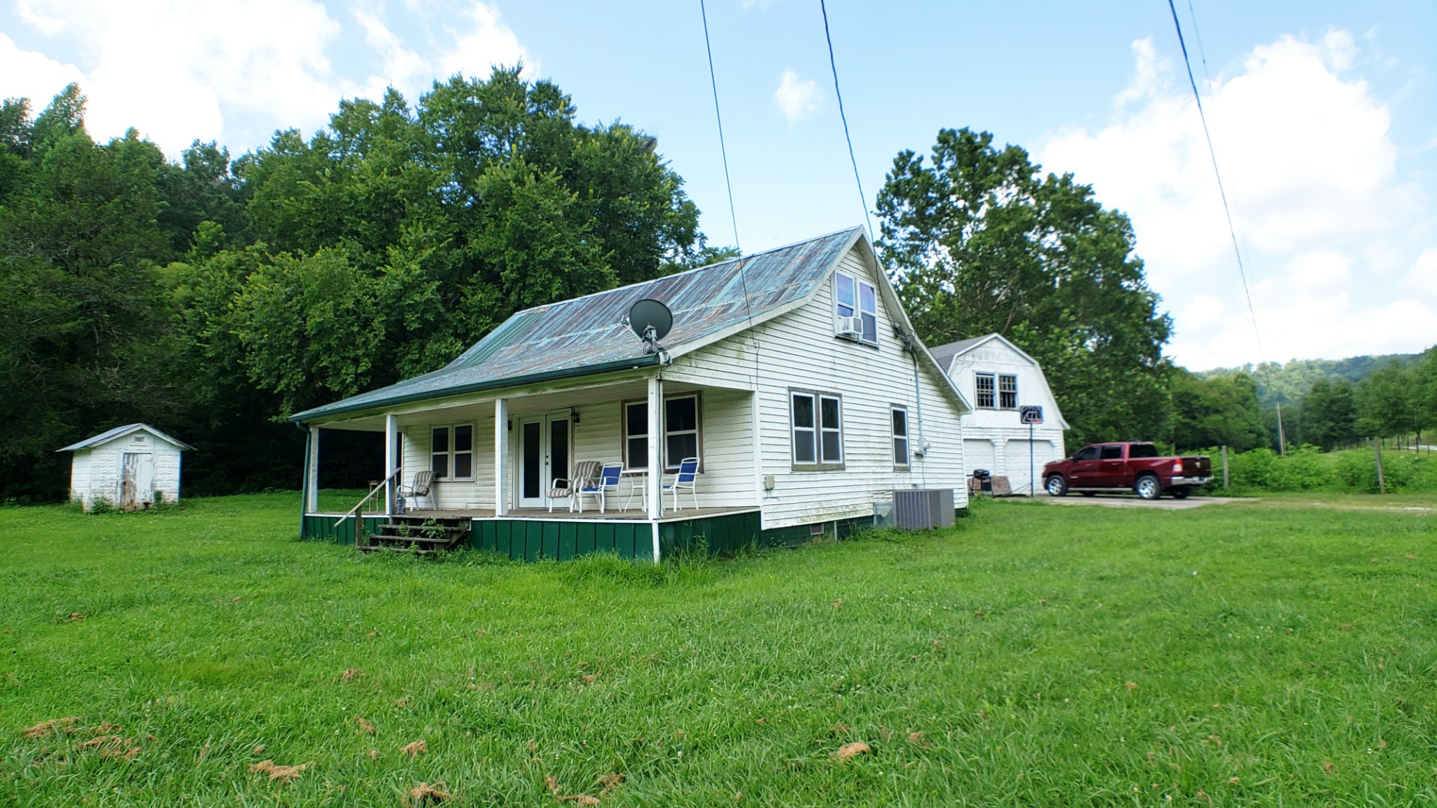 8100 Eaton Hollow Road Christiana, TN 37037 - Photo 15 of 27 a front view of house with yard and trees