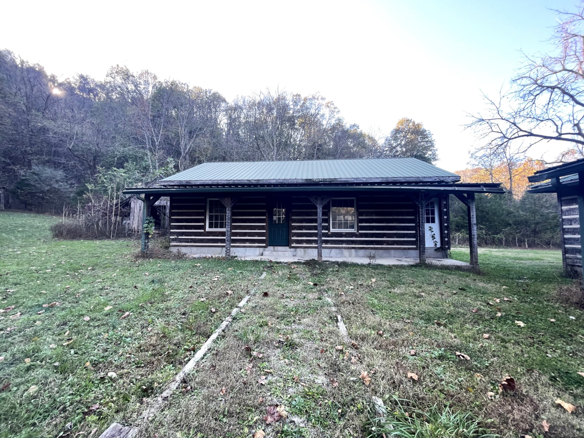 8100 Eaton Hollow Road Christiana, TN 37037 - Photo 6 of 27 a view of a house with a backyard