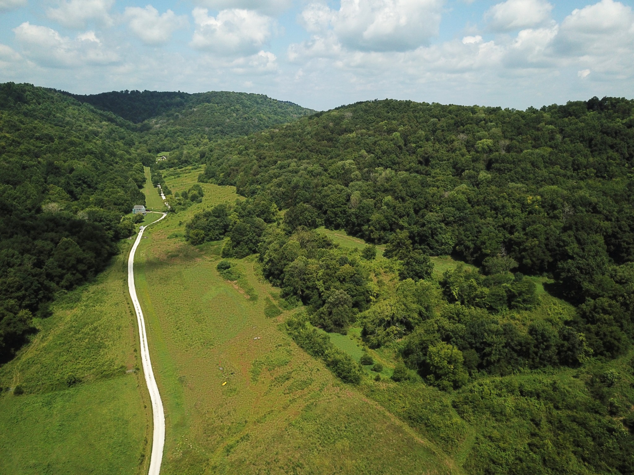 8100 Eaton Hollow Road Christiana, TN 37037 - Photo 7 of 27 a view of a lake with a mountain in the background