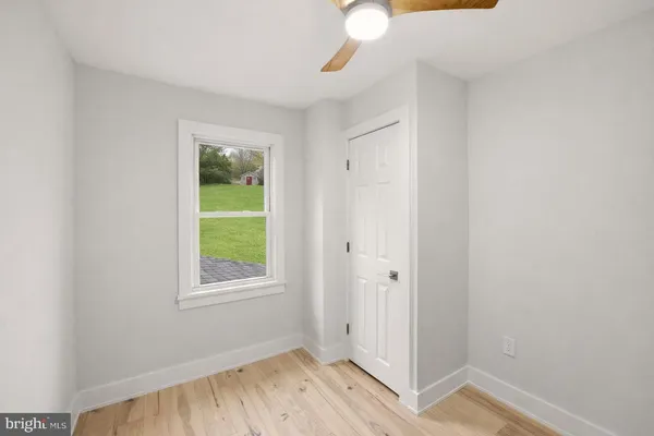 a view of a room that has a window in it