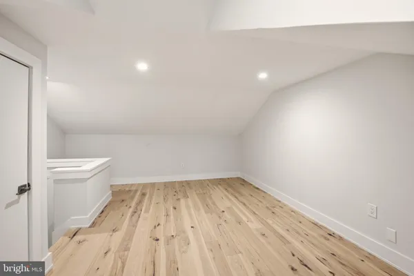 a view of wooden floor in a bathroom