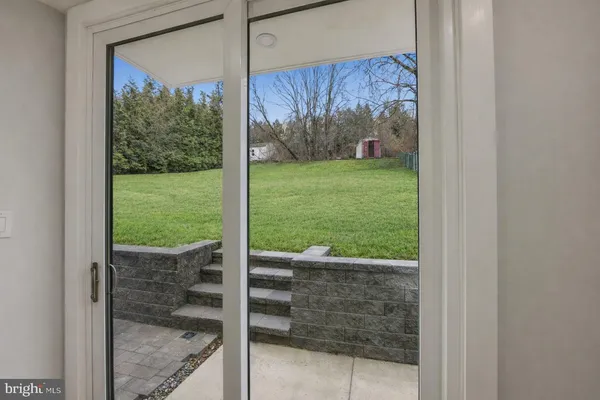a view of a porch with a yard
