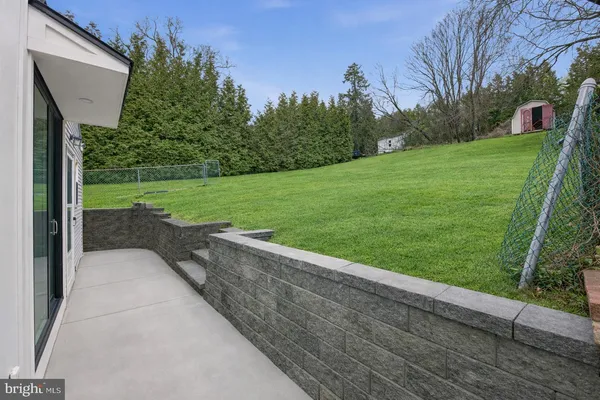 a view of a garden and basketball court
