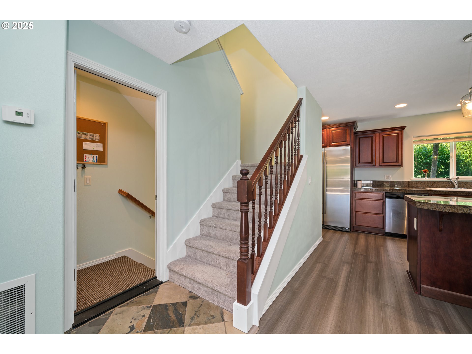 13150 D Street, Unit 12 Nehalem, OR 97131 - Photo 17 of 40 a view of kitchen with wooden floor and electronic appliances