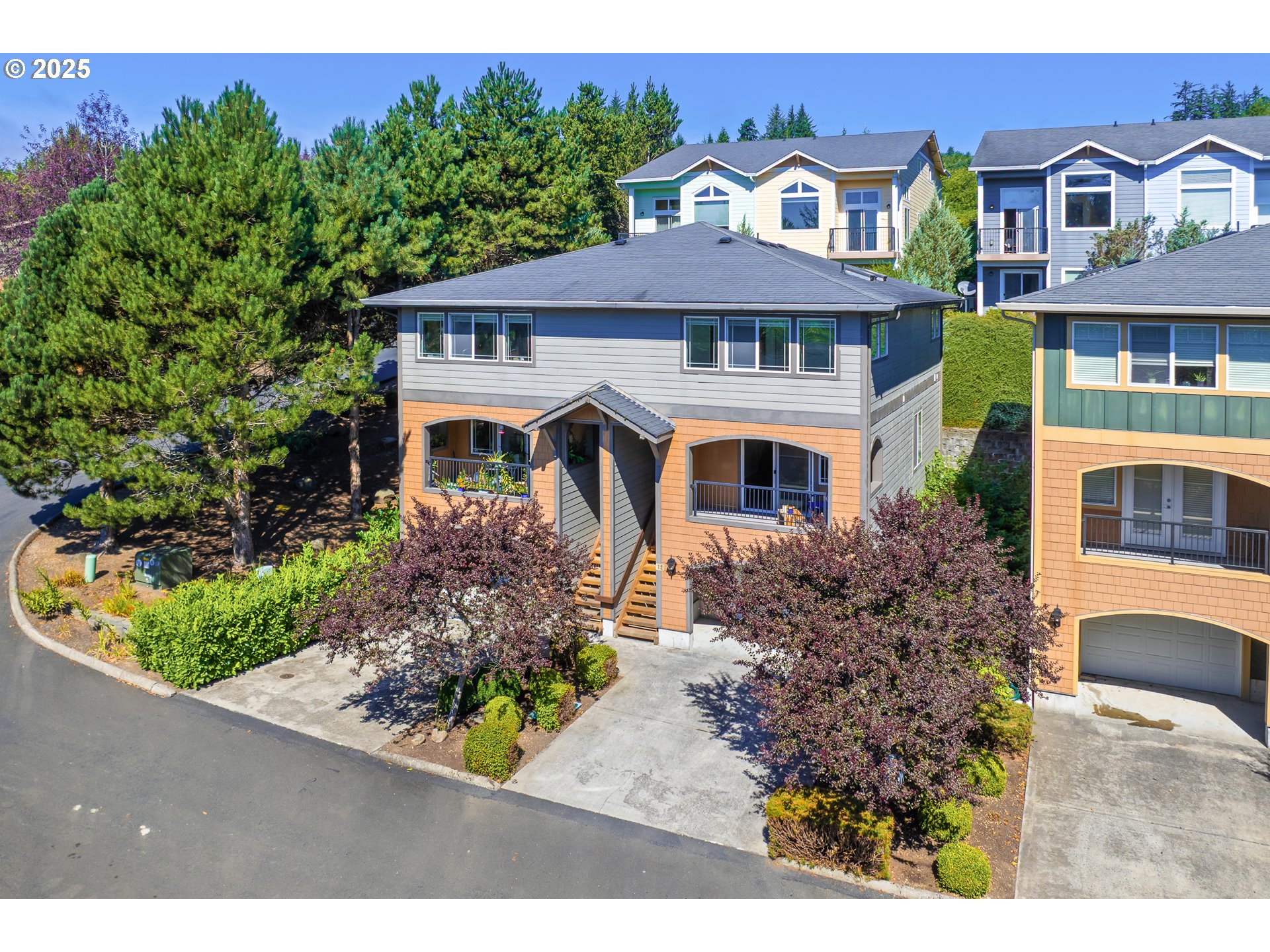 13150 D Street, Unit 12 Nehalem, OR 97131 - Photo 2 of 40 a front view of multi story residential apartment building