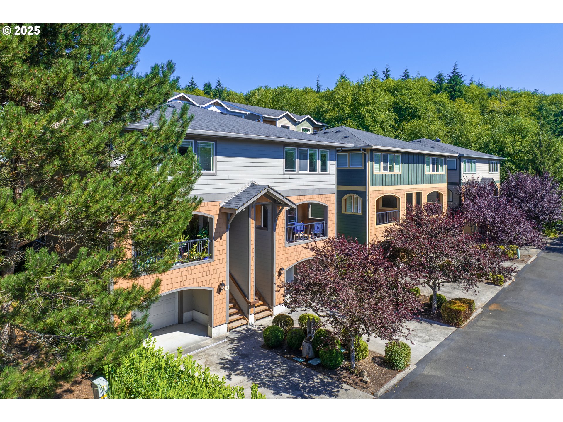 13150 D Street, Unit 12 Nehalem, OR 97131 - Photo 3 of 40 a view of a house with a yard