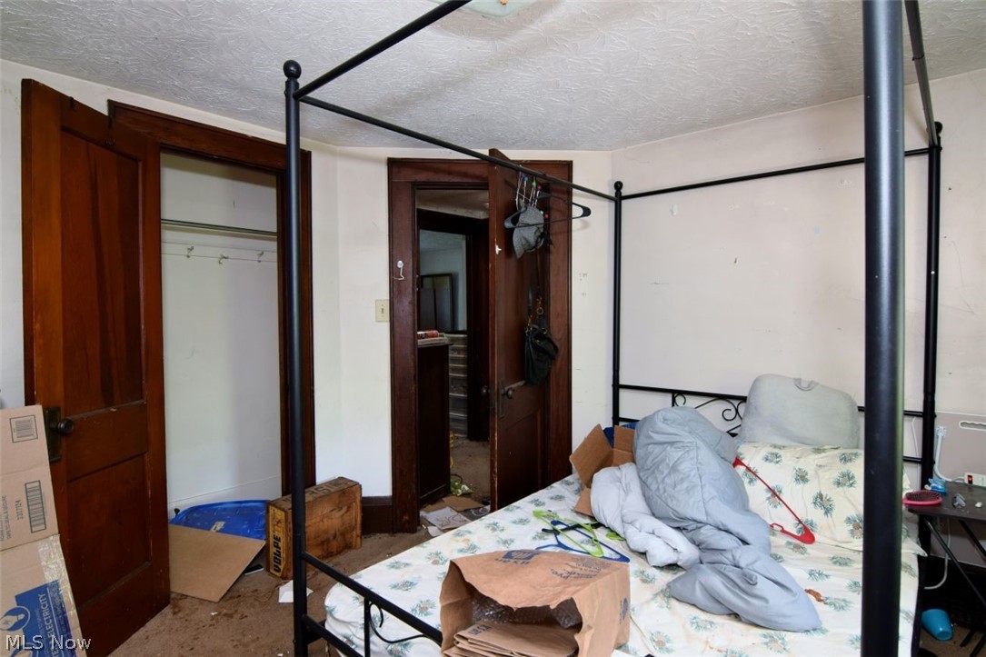 30 West Dalton Street Akron, OH 44310 - Photo 16 of 19 Bright second-floor bedroom with generous space.